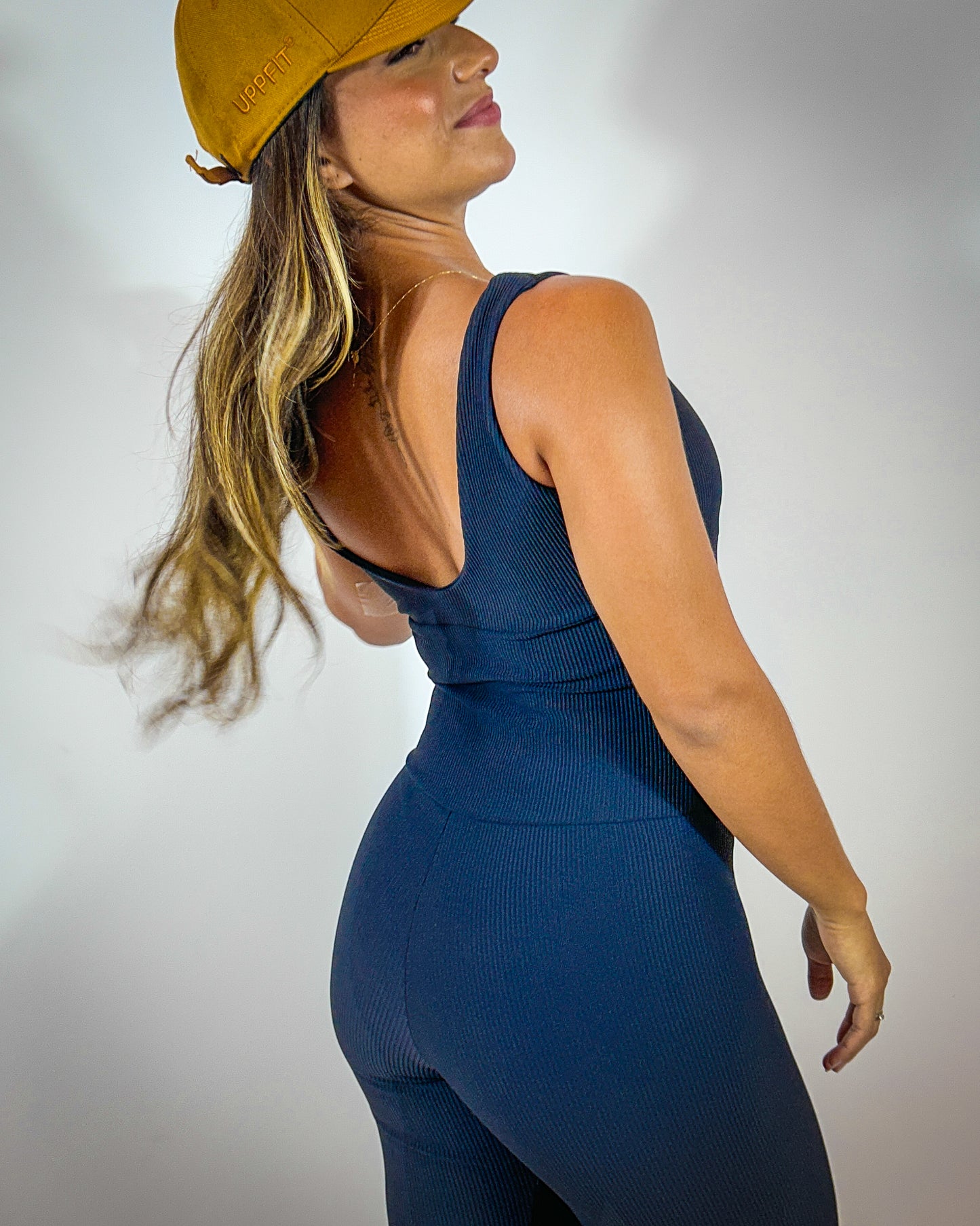 Macacão Feminino Canelado com Decote Cruzado em Malha Conforto – Uppfit